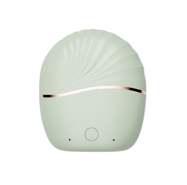 Mini Portable Hair Straightener in a stylish shell shape with a soft green finish and rose gold accent.
