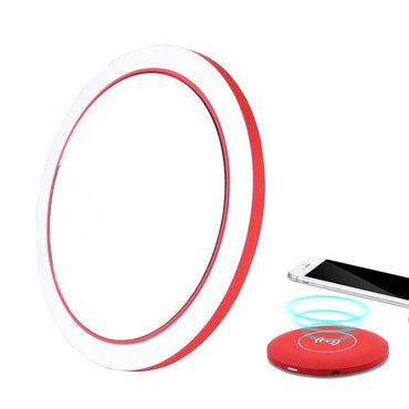 Rechargeable LED Handheld Makeup Mirror with wireless charging feature and bright LED lighting.
