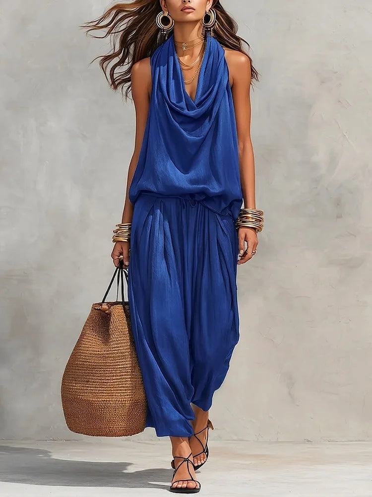 Model showcasing the Simona Two-Piece Top & Pants Set in blue, perfect for casual outings and travel.