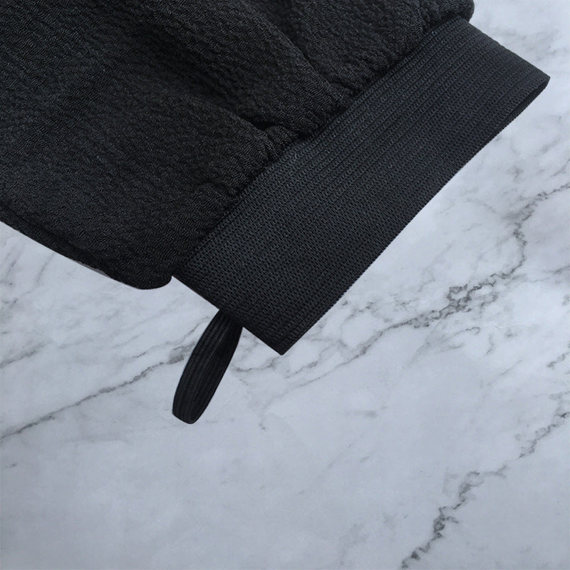 Scrub Exfoliating Gloves for Deep Cleansing & Smooth Skin close-up showing cuff design and texture.