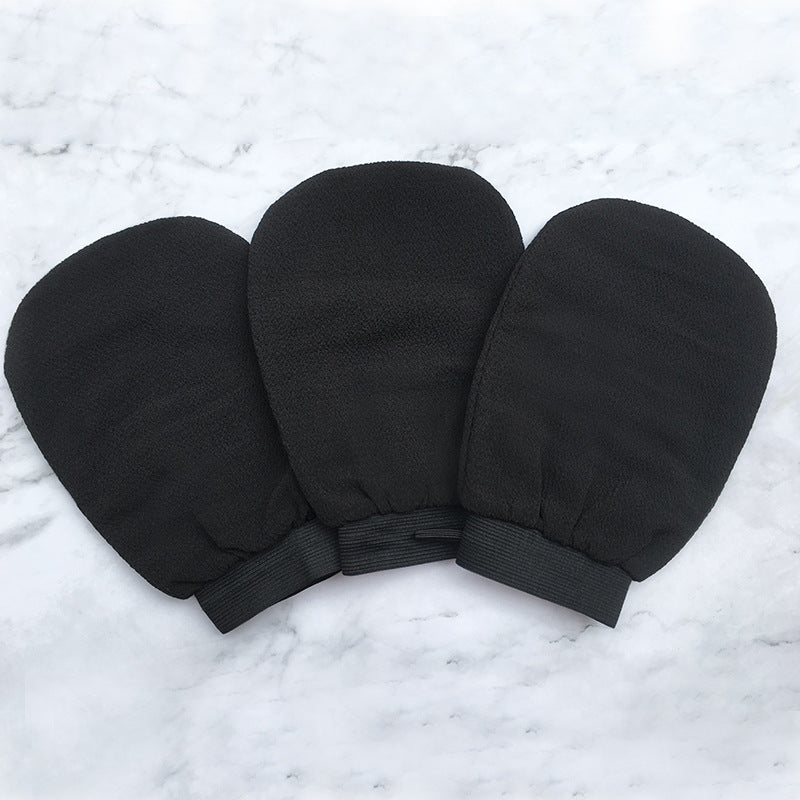 Scrub Exfoliating Gloves for Deep Cleansing & Smooth Skin, three pairs of black exfoliating mitts on marble background.