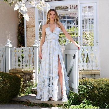 Vera Elegant Dress for Stylish Party & Casual Wear worn by a model, showcasing floral print and high slit design.