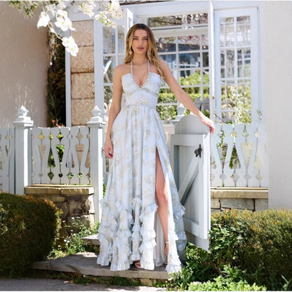 Vera Elegant Dress for Stylish Party & Casual Wear worn by a model, showcasing floral print and high slit design.