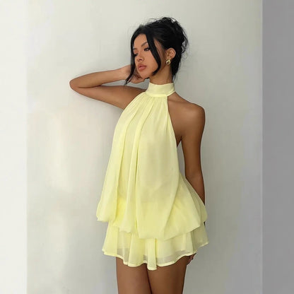 Backless Halter Mini Dress Y2K Party Outfit in soft yellow, perfect for trendy parties and special occasions.