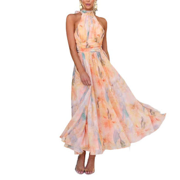 Elegant Flower Print Sleeveless Dress displayed on a model in a flowing design with pastel colors.