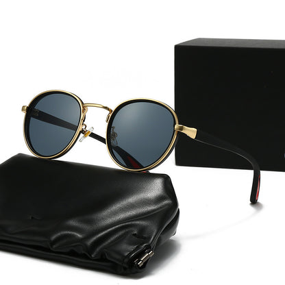 Vintage designer outdoor sunglasses displayed with a black case and gift box, combining retro style and modern comfort.