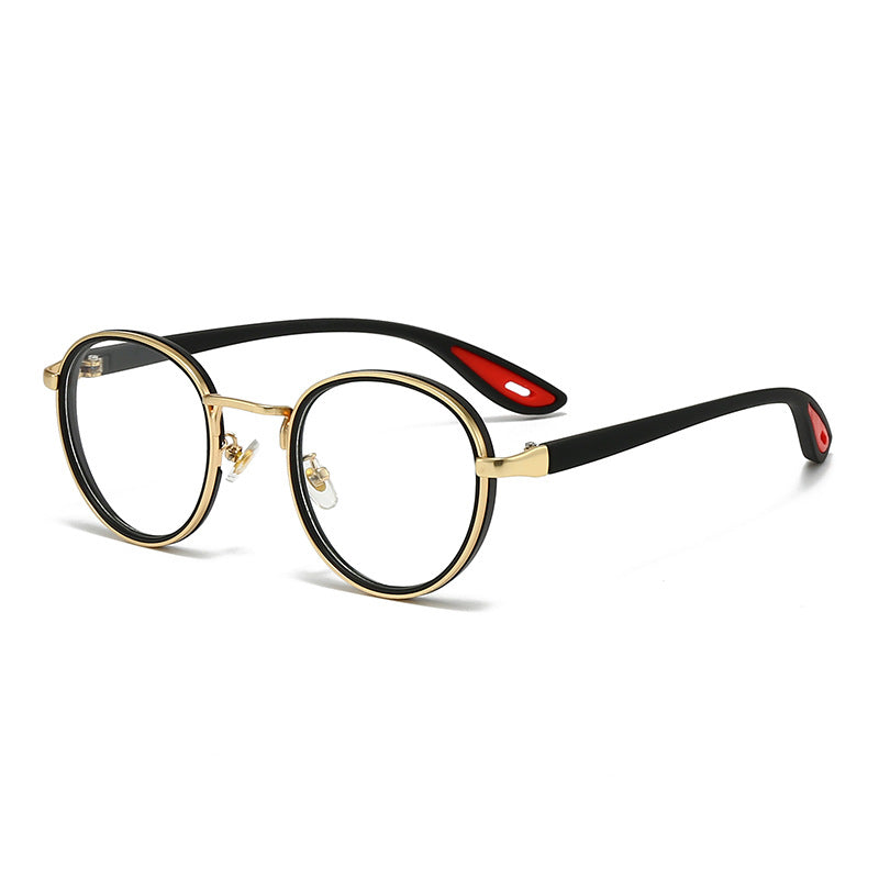 Vintage designer outdoor sunglasses in round shape with gold frame and black accents.