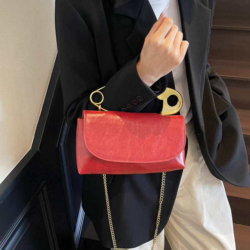 Luxury PU Leather Chain Shoulder Bag for Women in red with gold accents and chain, stylish fashion accessory for modern women.