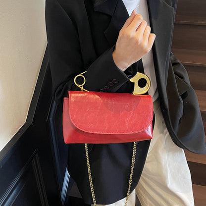Luxury PU Leather Chain Shoulder Bag for Women in red with gold accents and chain, stylish fashion accessory for modern women.
