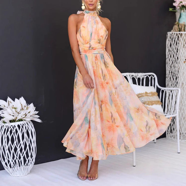 Elegant Flower Print Sleeveless Dress showcased on a model in a bright, vibrant floral design.