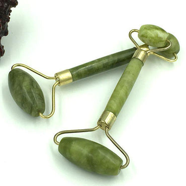 Double Head Jade Face Massage Roller for soothing facial massage and skincare routines.