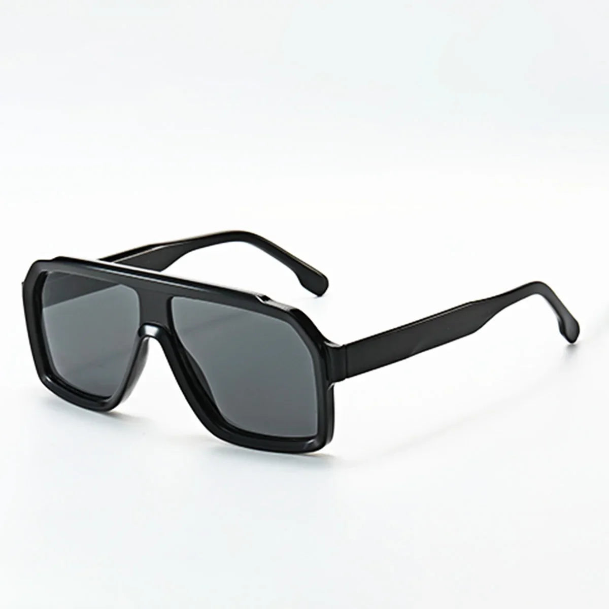 Raven Retro Sunglasses Vintage UV Protection Eyewear with bold black frame and dark lenses on white background.