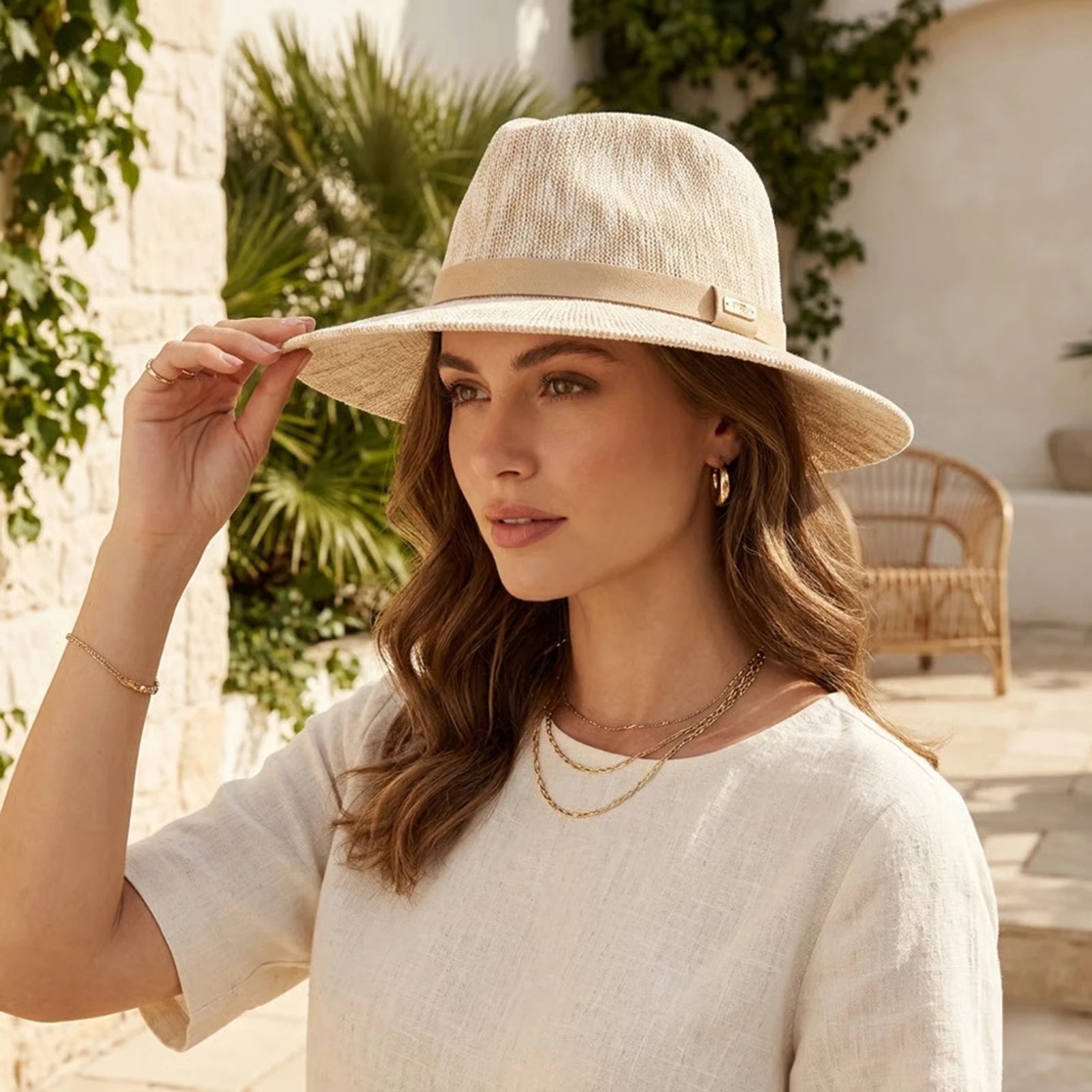 Packable Fedora Hat Wide Brim Travel Summer Unisex worn by a woman outdoors, showcasing its stylish design.