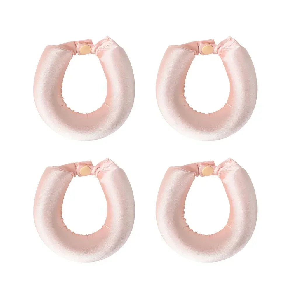 Heatless Hair Curler Curling Rod Headband set of four pink curling rods for creating beautiful curls without heat.