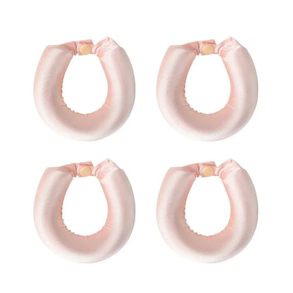 Heatless Hair Curler Curling Rod Headband set of four pink curling rods for creating beautiful curls without heat.