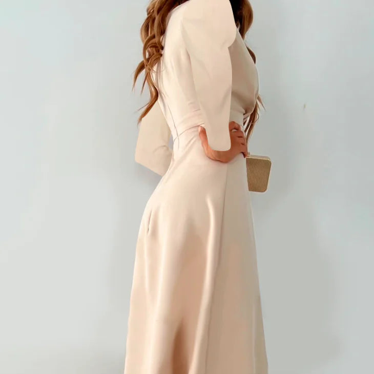 Women's Long-sleeved V-neck Pleated Split Dress showcased from the side, highlighting its elegant design and pleated detail.