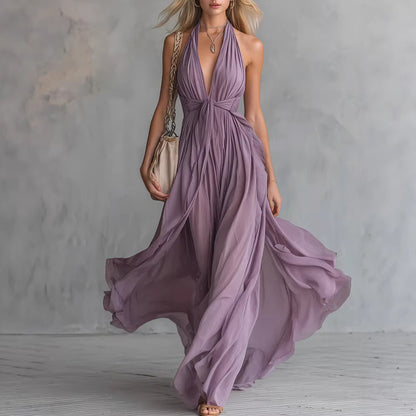 FLAVIA Long Purple Dress Keyhole Neckline Chiffon Lace Trim flowing in the wind, showcasing elegance and style.