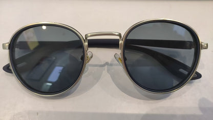 Vintage designer outdoor sunglasses featuring a round frame and dark lenses, perfect for stylish outdoor wear.
