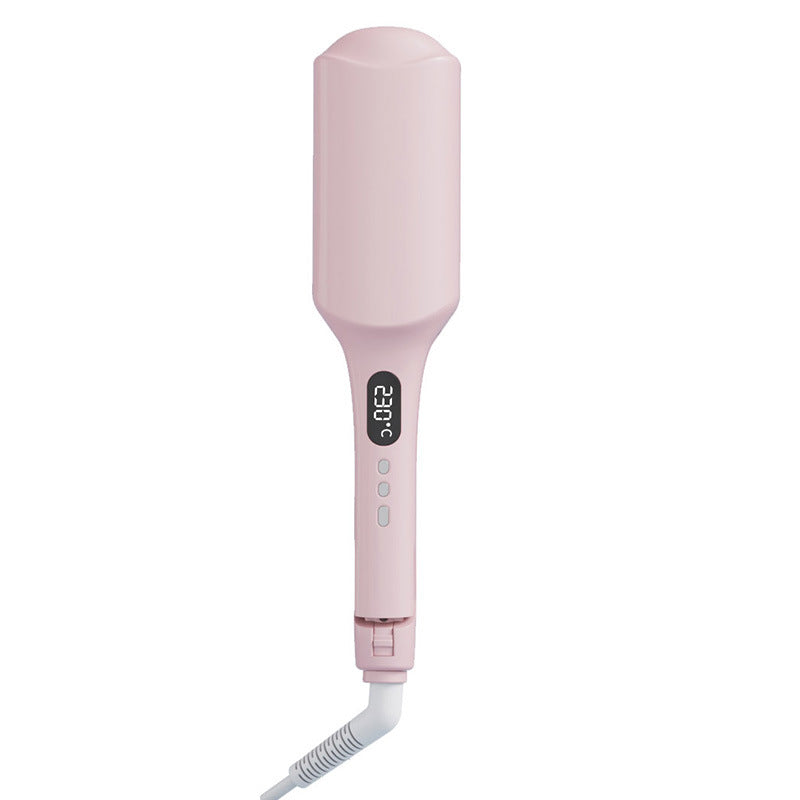 Ultimate Waver Curling Iron for Beach Waves & Hair Styling in sleek pink design.