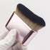 Magic Makeup Brush for Flawless Foundation & Smooth Blend held in a gloved hand, showcasing its soft bristles and elegant design.